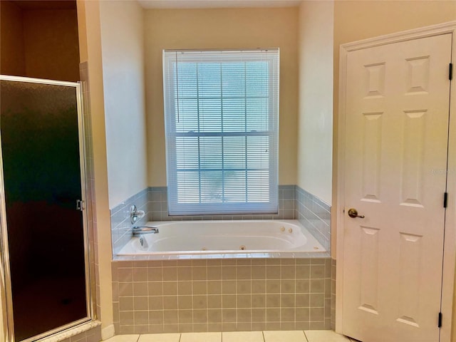 19480 SW 100th Loop, Dunnellon, FL 34432 - full bathroom with a shower stall and a jetted tub