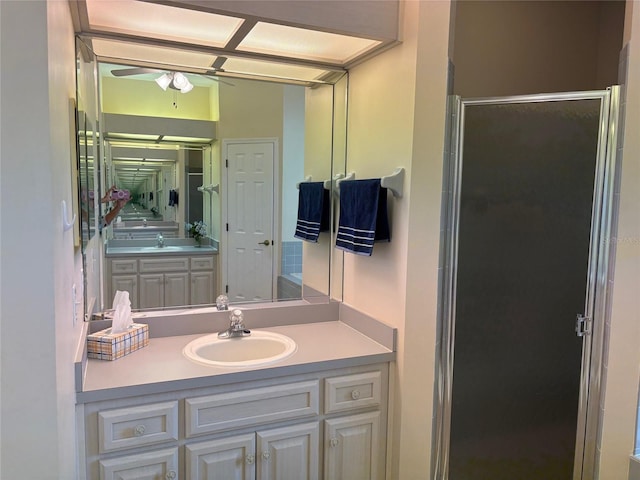 19480 SW 100th Loop, Dunnellon, FL 34432 - full bath featuring vanity, a shower stall, and a ceiling fan