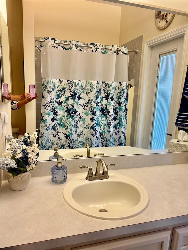 19480 SW 100th Loop, Dunnellon, FL 34432 - bathroom featuring vanity and a shower with curtain
