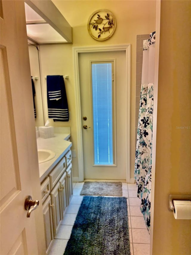 19480 SW 100th Loop, Dunnellon, FL 34432 - full bath with vanity, tile patterned flooring, and curtained shower