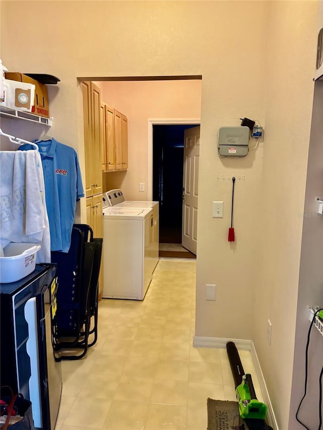 19480 SW 100th Loop, Dunnellon, FL 34432 - laundry area with washing machine and dryer and cabinet space