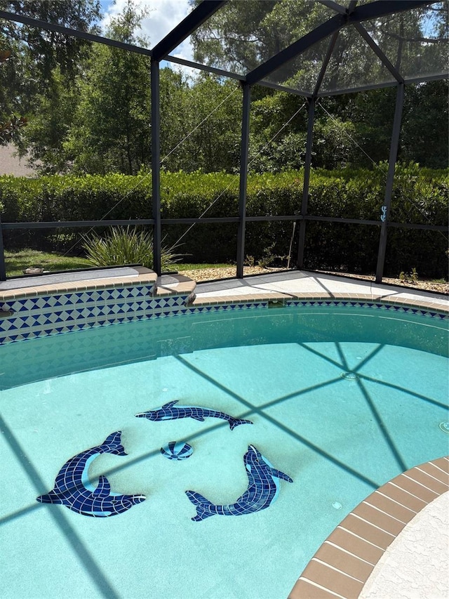 19480 SW 100th Loop, Dunnellon, FL 34432 - outdoor pool featuring glass enclosure