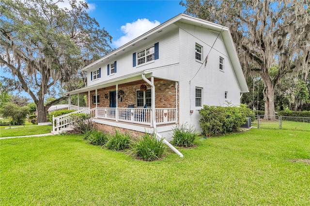 510 SE 19th St, Ocala, FL 34471 - view of front of home with covered porch and brick siding