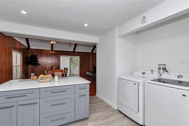 510 SE 19th St, Ocala, FL 34471 - laundry area featuring washing machine and clothes dryer, wood walls, light wood-style flooring, cabinet space, and recessed lighting