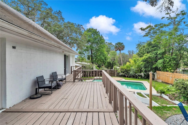 510 SE 19th St, Ocala, FL 34471 - wooden deck with a fenced backyard