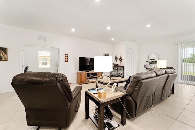 6175 SW 88th Loop, Ocala, FL 34476 - living room with recessed lighting and light tile patterned floors