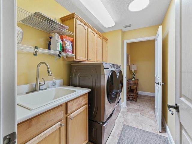 2721 Day Lily Run, The Villages, FL 32162 - laundry area with cabinet space and washer and dryer
