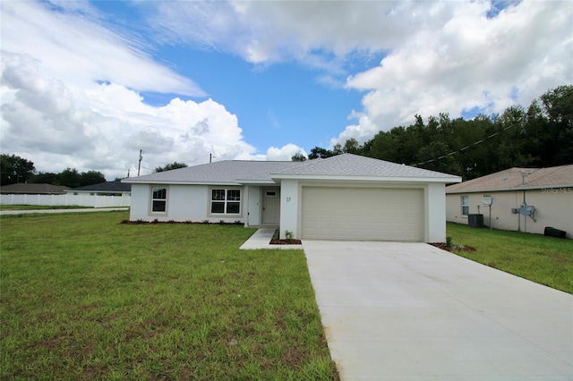 9 Hemlock Terrace Ln, Ocala, FL 34472 - single story home featuring a garage, concrete driveway, stucco siding, and a shingled roof
