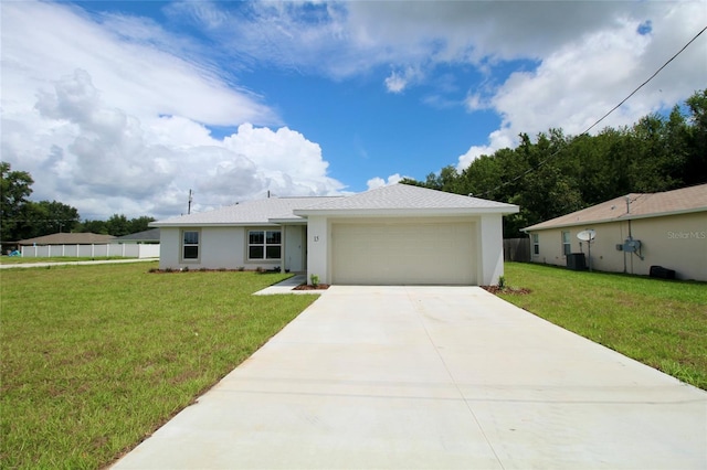 9 Hemlock Terrace Ln, Ocala, FL 34472 - single story home with driveway, a garage, and stucco siding
