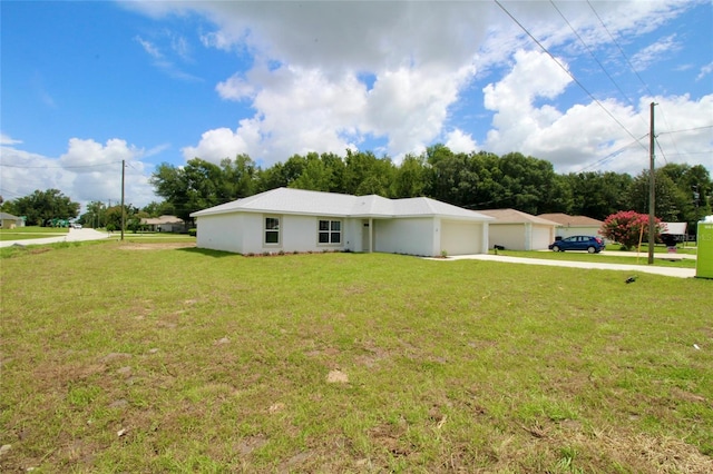 9 Hemlock Terrace Ln, Ocala, FL 34472 - single story home with concrete driveway, a garage, and a front yard