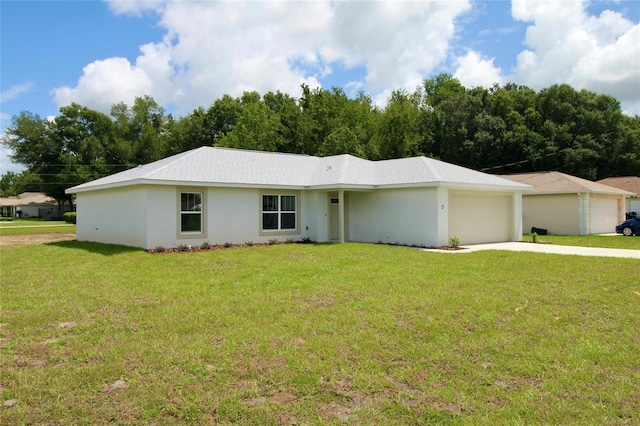 9 Hemlock Terrace Ln, Ocala, FL 34472 - ranch-style house featuring concrete driveway, a garage, a front yard, and stucco siding