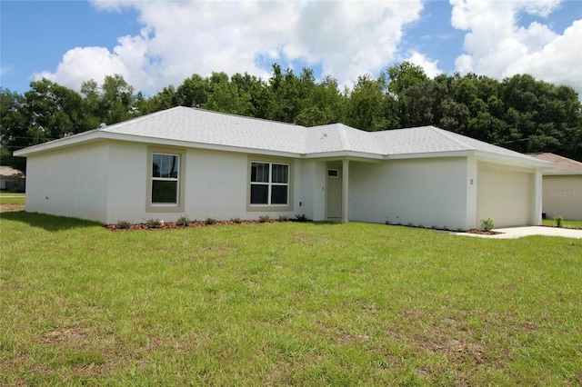 9 Hemlock Terrace Ln, Ocala, FL 34472 - single story home with an attached garage, a front lawn, and stucco siding