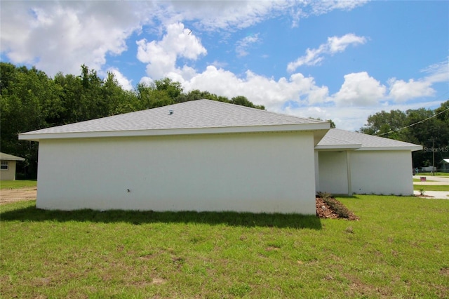 9 Hemlock Terrace Ln, Ocala, FL 34472 - view of side of home with a lawn