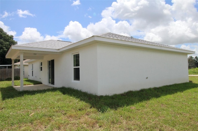 9 Hemlock Terrace Ln, Ocala, FL 34472 - rear view of property with stucco siding and a patio
