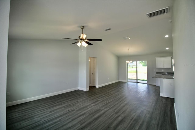 9 Hemlock Terrace Ln, Ocala, FL 34472 - unfurnished living room featuring a chandelier, dark wood finished floors, a ceiling fan, lofted ceiling, and recessed lighting