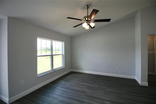 9 Hemlock Terrace Ln, Ocala, FL 34472 - spare room with vaulted ceiling, dark wood-style flooring, and a ceiling fan