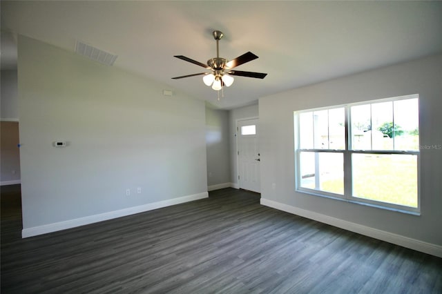 9 Hemlock Terrace Ln, Ocala, FL 34472 - unfurnished living room with dark wood-style floors and ceiling fan