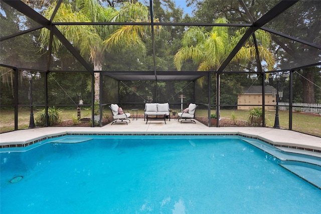581 NE 44th Ave, Ocala, FL 34470 - outdoor pool featuring glass enclosure and a patio