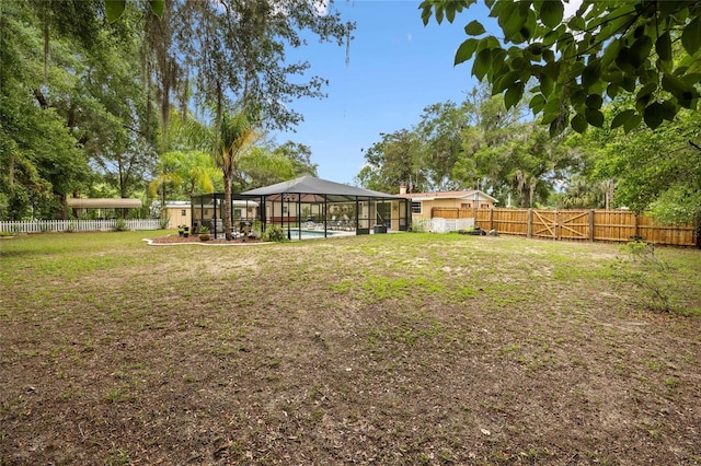 581 NE 44th Ave, Ocala, FL 34470 - fenced backyard featuring a lanai