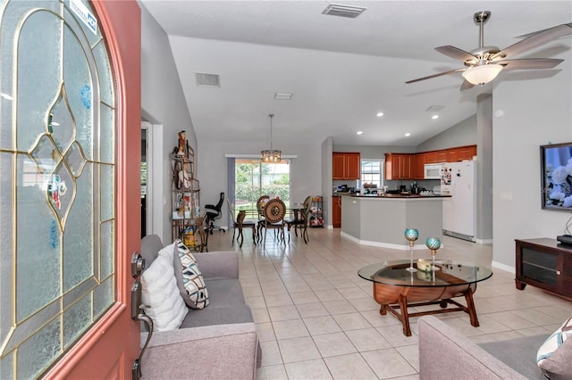 3453 SE 147th Ln, Summerfield, FL 34491 - living area with light tile patterned floors, a ceiling fan, recessed lighting, and high vaulted ceiling