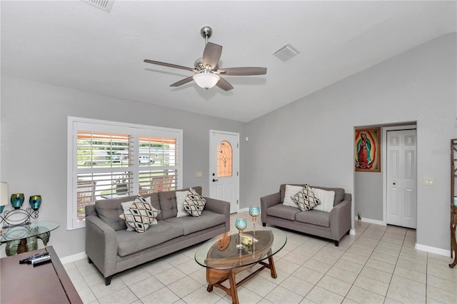 3453 SE 147th Ln, Summerfield, FL 34491 - living area with vaulted ceiling, ceiling fan, and light tile patterned floors