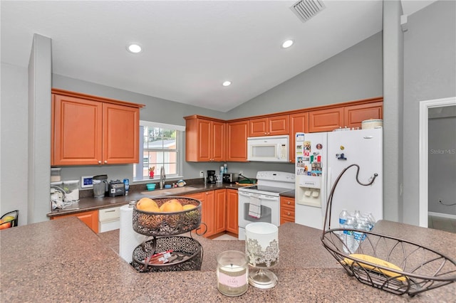 3453 SE 147th Ln, Summerfield, FL 34491 - kitchen with white appliances, lofted ceiling, recessed lighting, and dark countertops