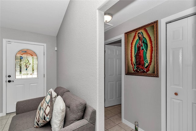 3453 SE 147th Ln, Summerfield, FL 34491 - foyer with light tile patterned floors