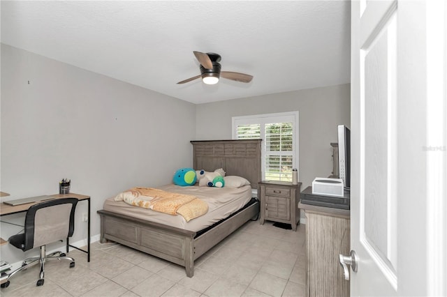 3453 SE 147th Ln, Summerfield, FL 34491 - bedroom with light tile patterned floors, ceiling fan, and an office area
