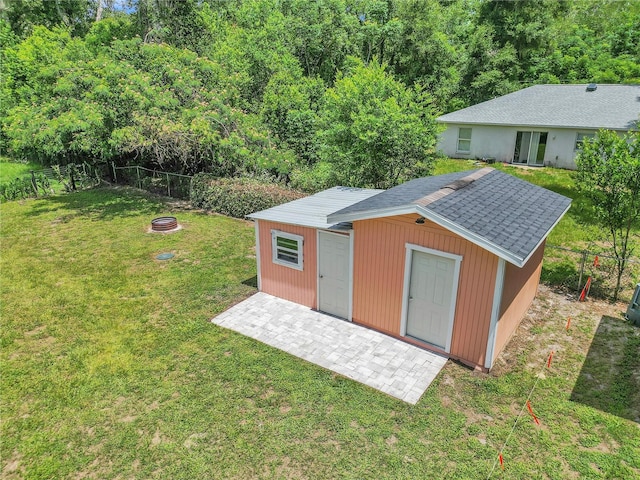 3453 SE 147th Ln, Summerfield, FL 34491 - view of outdoor structure featuring an outdoor fire pit