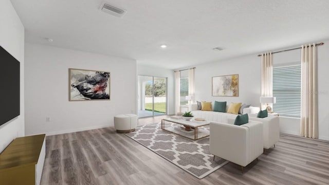 13261 SW 56th Ter, Ocala, FL 34473 - living area with wood finished floors and recessed lighting