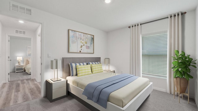 13261 SW 56th Ter, Ocala, FL 34473 - bedroom with light carpet, recessed lighting, and light wood-style flooring