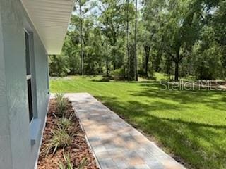 1467 E Odin Dr, Citrus Springs, FL 34434 - view of grassy yard