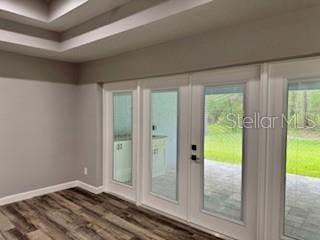 1467 E Odin Dr, Citrus Springs, FL 34434 - doorway featuring wood finished floors and french doors