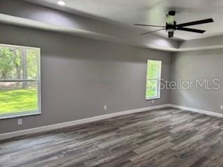 1467 E Odin Dr, Citrus Springs, FL 34434 - spare room with wood finished floors and ceiling fan