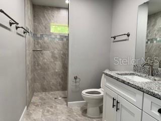 1467 E Odin Dr, Citrus Springs, FL 34434 - full bath with vanity, tiled shower, and marble finish floors