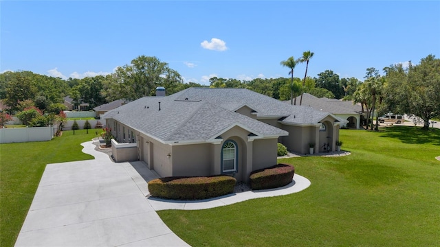 3629 SE 54th Ave, Ocala, FL 34480 - view of front of property with driveway, roof with shingles, stucco siding, and an attached garage