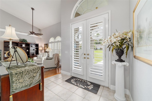 3629 SE 54th Ave, Ocala, FL 34480 - foyer featuring french doors, light tile patterned floors, ceiling fan, and high vaulted ceiling