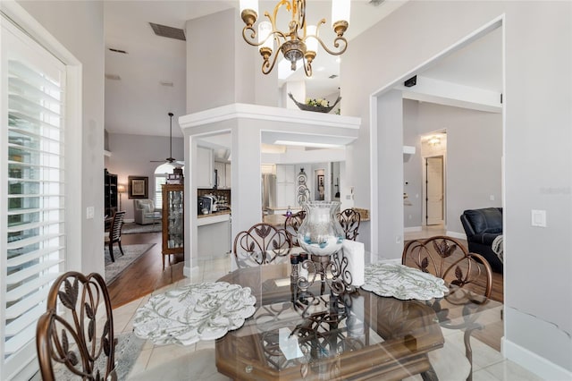 3629 SE 54th Ave, Ocala, FL 34480 - dining room with plenty of natural light, a chandelier, and a towering ceiling