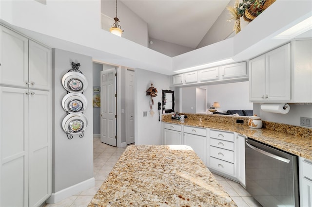 3629 SE 54th Ave, Ocala, FL 34480 - kitchen with dishwasher, light tile patterned flooring, white cabinets, light stone countertops, and vaulted ceiling
