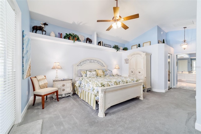 3629 SE 54th Ave, Ocala, FL 34480 - bedroom with carpet floors, vaulted ceiling, ensuite bath, and a ceiling fan