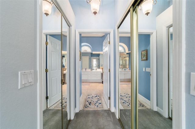 3629 SE 54th Ave, Ocala, FL 34480 - hallway with carpet floors and tile patterned floors
