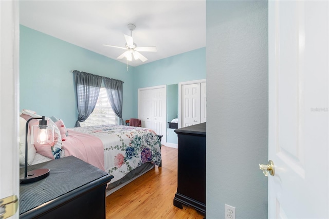 3629 SE 54th Ave, Ocala, FL 34480 - bedroom featuring multiple closets, wood finished floors, and a ceiling fan