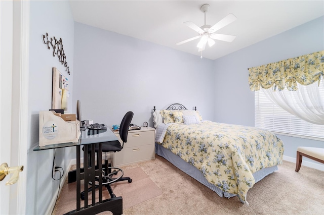3629 SE 54th Ave, Ocala, FL 34480 - bedroom with light colored carpet, a desk, and a ceiling fan