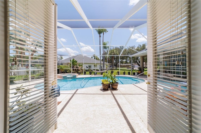 3629 SE 54th Ave, Ocala, FL 34480 - view of pool with a patio area, a pool with connected hot tub, and glass enclosure