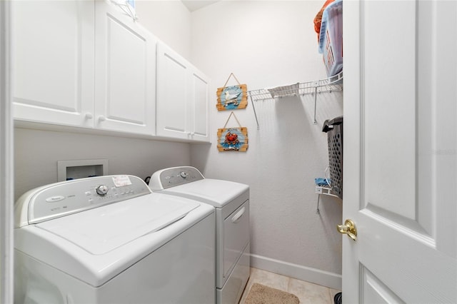 3629 SE 54th Ave, Ocala, FL 34480 - laundry room with separate washer and dryer, cabinet space, and light tile patterned floors