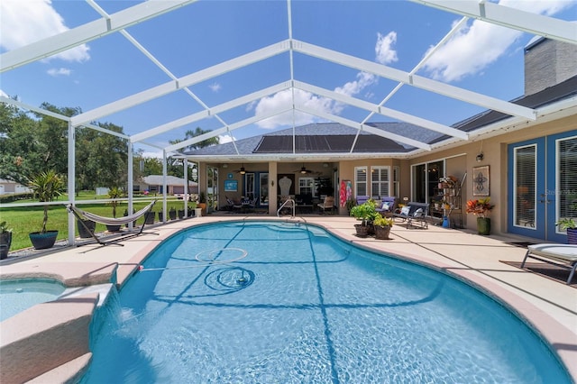 3629 SE 54th Ave, Ocala, FL 34480 - swimming pool with french doors, ceiling fan, a patio, and a lanai