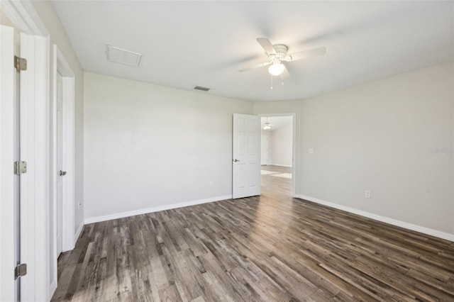 146 Juniper Loop Cir, Ocala, FL 34480 - spare room with dark wood-style floors and a ceiling fan