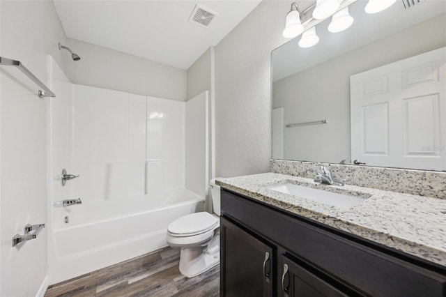 146 Juniper Loop Cir, Ocala, FL 34480 - full bath with wood finished floors, vanity, and bathing tub / shower combination