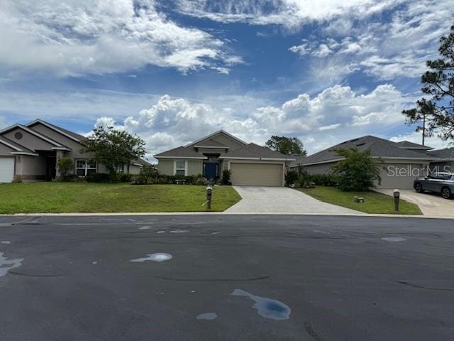 5 Diamond Cove Ct, Ocala, FL 34472 - single story home featuring an attached garage, driveway, and a front yard