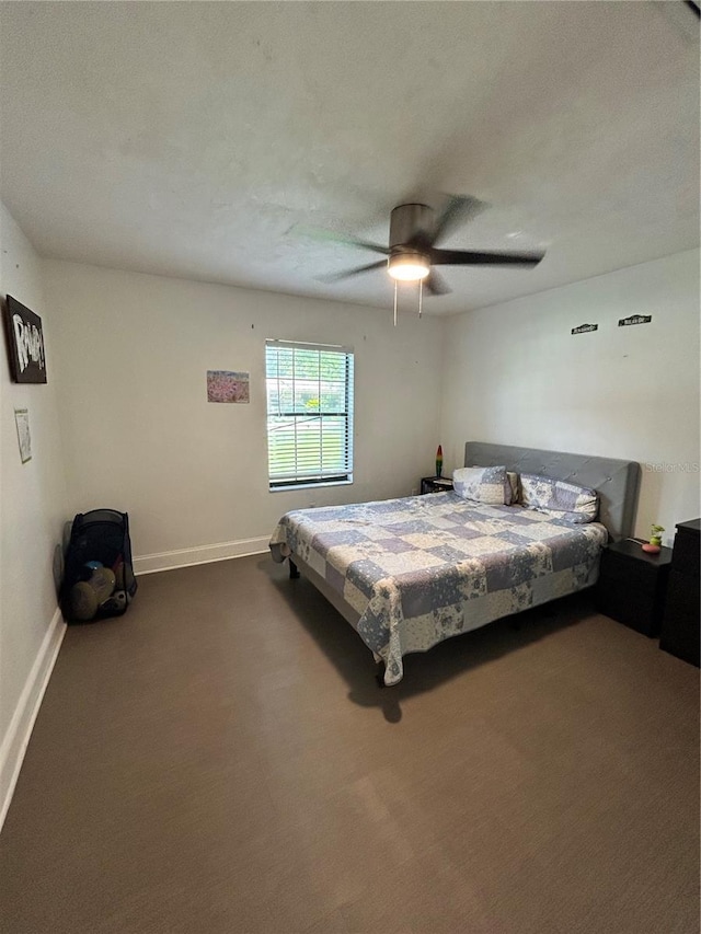 2070 SE 50th Ter, Ocala, FL 34480 - carpeted bedroom with baseboards and a ceiling fan